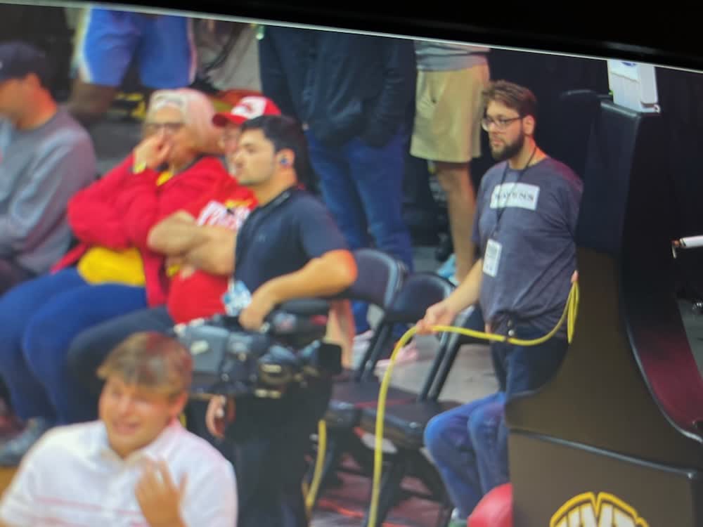 Courtside at UMBC with the keeper on a belt